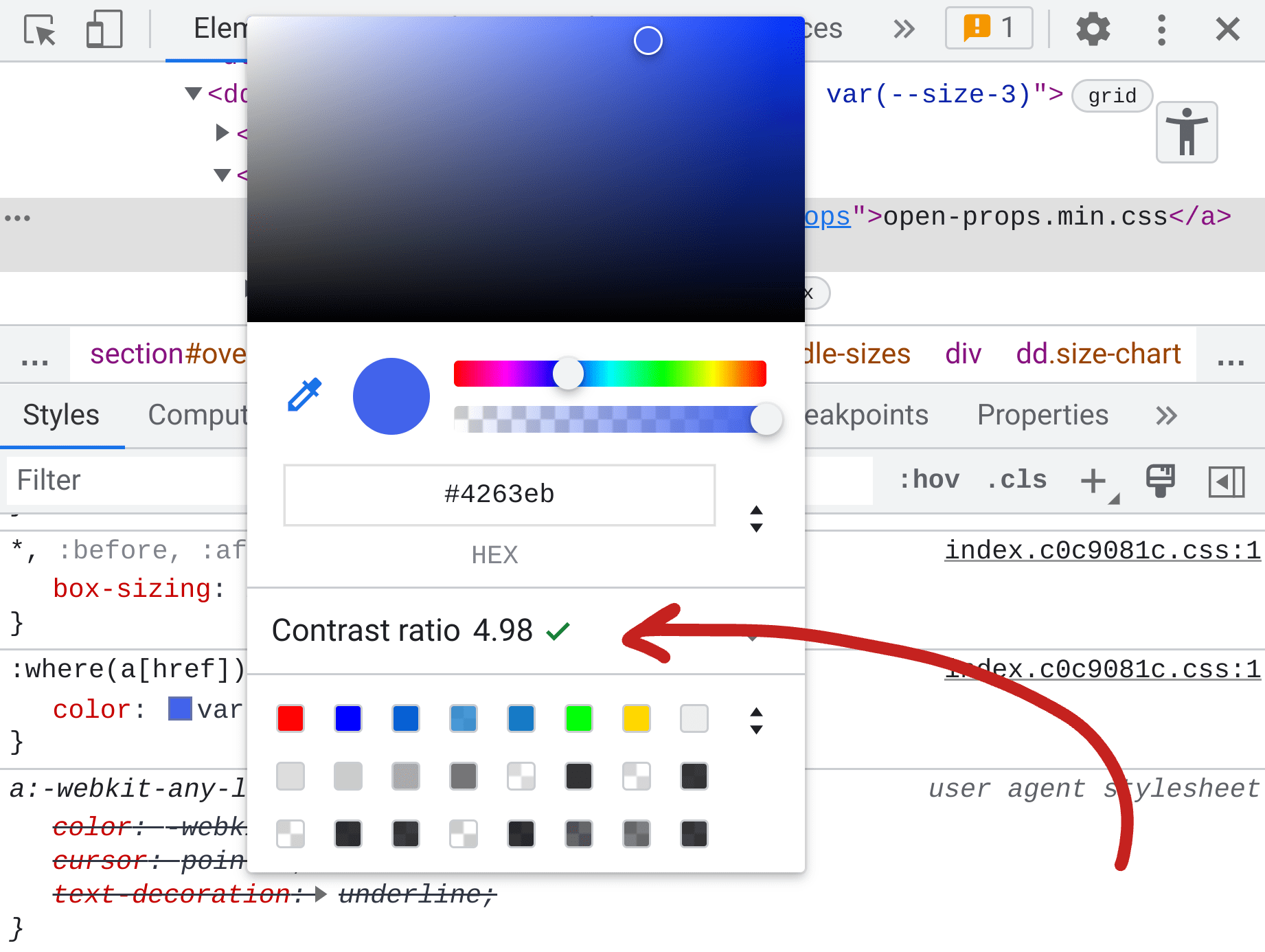 Captura de tela do painel &quot;Elements&quot; das ferramentas do desenvolvedor.Nos estilos, o seletor de cores é mostrado e, no meio, é informado o índice de contraste da cor de 4,98.